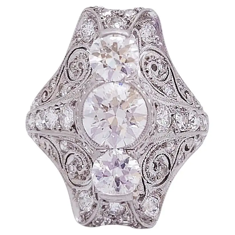 1930s-Art-Deco-Three-Stone-Diamond-Ring-1.webp