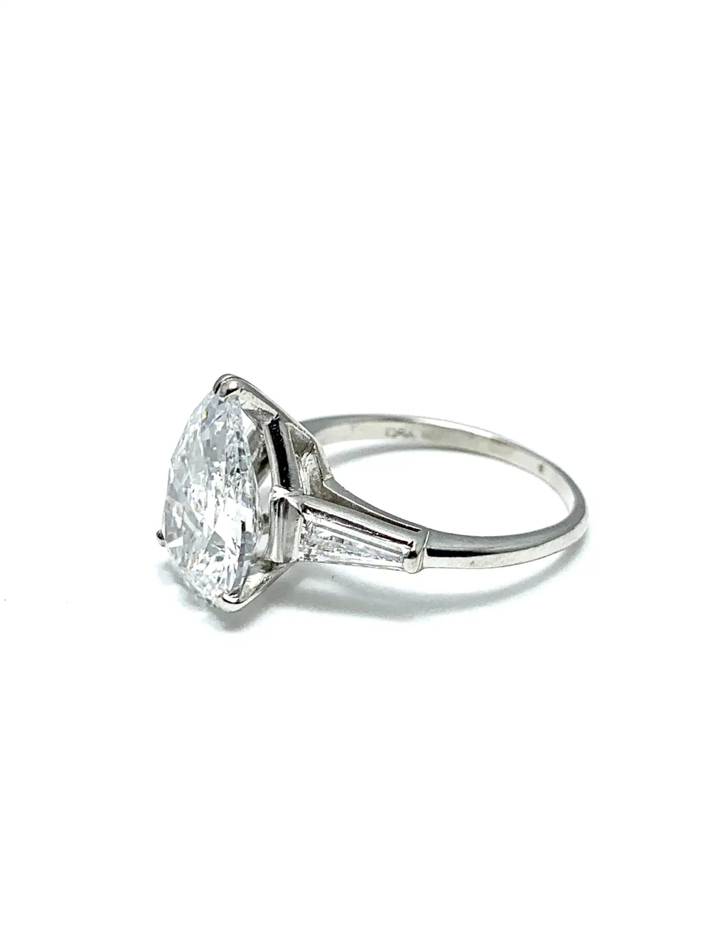 3.14-Carat-D-SI1-Pear-Shape-Diamond-and-Baguette-Diamond-Platinum-Ring-4.webp