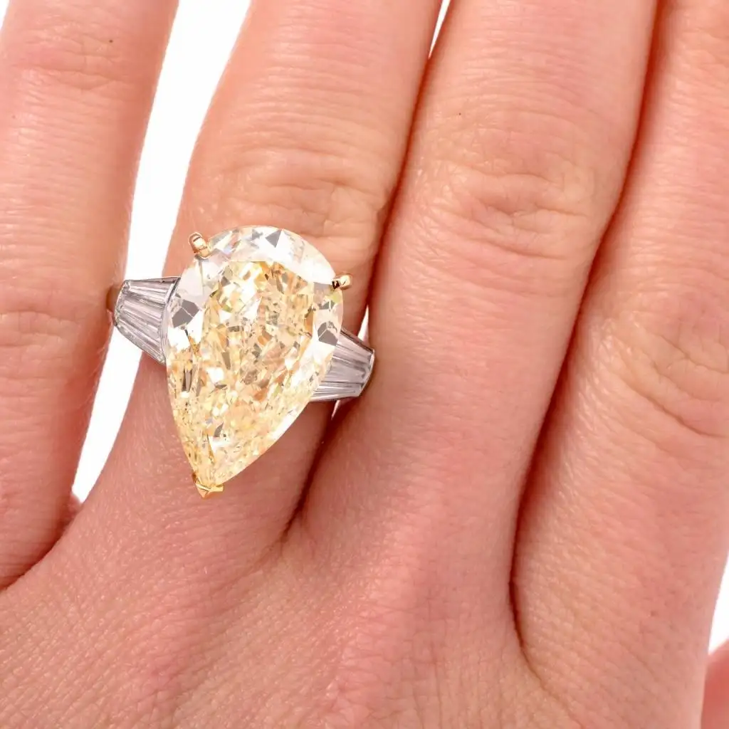 GIA-13.41-Carat-Natural-Fancy-Pear-Diamond-with-Baguette-Platinum-and-Gold-Ring-5.webp